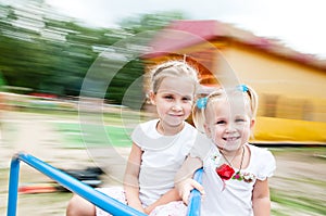 Kids rotate on a carousel