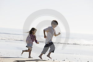 Kids Running on Beach