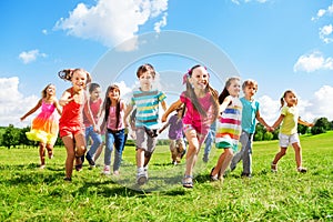 Kids running enjoying summer