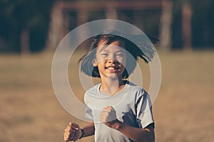 Kids running and playing on field