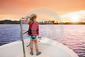 Kids sail on yacht in sea. Child sailing on boat.