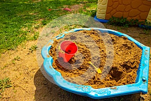 Kids sand playground toys on the grass