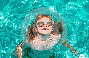 Kids on sea beach. Happy kid playing in swimming pool on summer day. Child water vacation. Children play in tropical