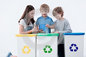 Kids segregating trash