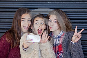 Kids selfie with cell smart or mobile phone