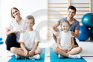 Kids sitting on blue yoga mats with their physician