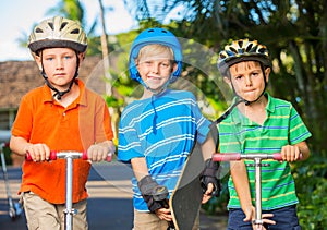 Kids with Skate Boards and Scooters