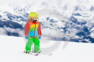 Kids ski. Winter family snow sport. Child skiing