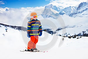 Kids ski. Winter family snow sport. Child skiing