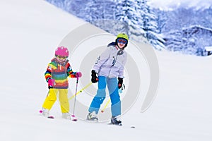 Kids skiing in the mountains