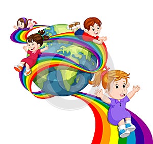 Kids sliding on rainbow in sky