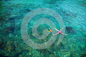 Kids snorkel. Children snorkeling in tropical sea