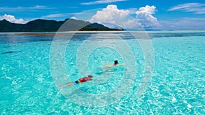 Kids snorkel. Children snorkeling in tropical sea