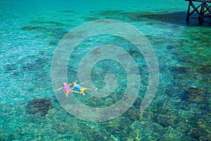 Kids snorkel. Children snorkeling in tropical sea