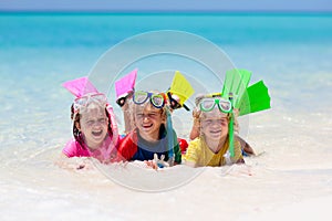 Kids snorkel. Children snorkeling in tropical sea photo
