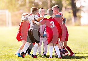 Kids soccer football - children players match on soccer field