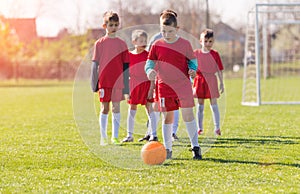 Kids soccer football - children players match on soccer field