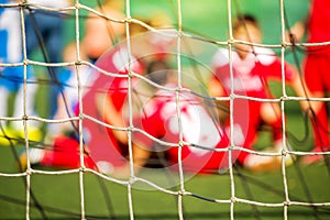 Kids soccer team celebrate goal and victory