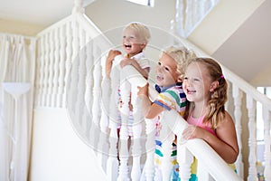 Kids on stairs. Child moving into new home