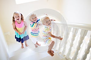 Kids on stairs. Child moving into new home