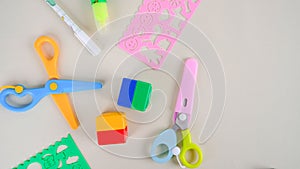 kids stationary, cute scissors, pen, sharpener, ruler white background