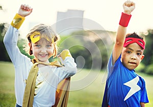 Kids Superheroes Fun Costumes Play Concept photo
