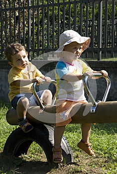 Kids on swing in the park