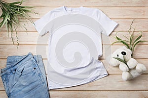 Kids T-shirt mockup with koala bear toy