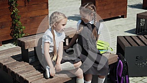 Kids talking in schoolyard