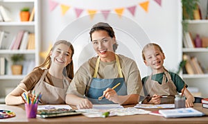 kids and teacher at the art class