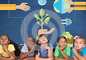 Kids thinking together and blue wall with recycling and renewable graphics