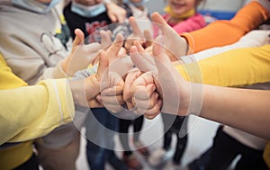 Kids with thumbs up sign