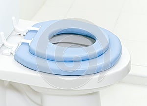 Kid toilet bowl adapter kit isolated photo