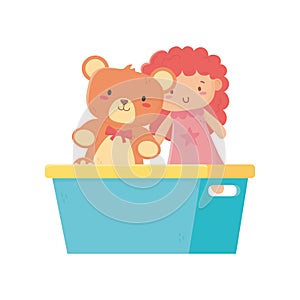 Kids toy, teddy bear and little doll in bucket toys