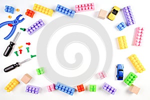 Kids toys frame on white background. Top view. Flat lay.