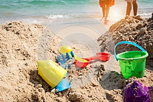 Kids toys on tropical sand beach