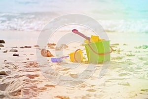 Kids toys on tropical sand beach