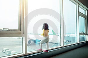 Kids Traveling Concept. Backside of A Two Years old Girl Waiting