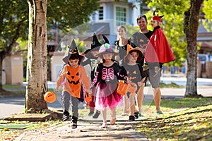 Kids trick or treat. Halloween fun for children