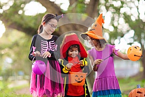 Kids trick or treat. Halloween fun for children