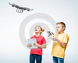 Kids using digital tablet and hexacopter drone