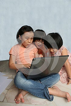 Kids using laptop