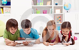 Kids using tablet computers