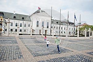Kids walking at Grassalkovich Palace, Bratislava, Europe. Residence of the president of Slovakia in Bratislava