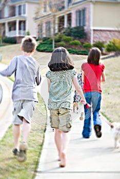 Kids Walking up Sidewalk/Blur