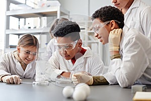 Kids Watching Science Experiment in Lab