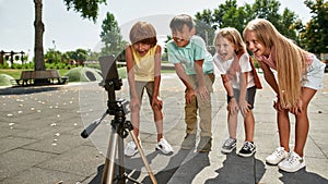 Kids watching on smartphone during making video