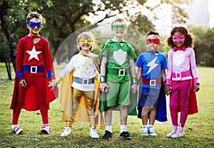 Kids Wear Superhero Costume Outdoors