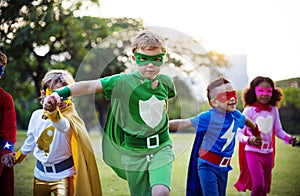 Kids Wear Superhero Costume Outdoors