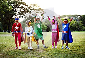 Kids Wear Superhero Costume Outdoors